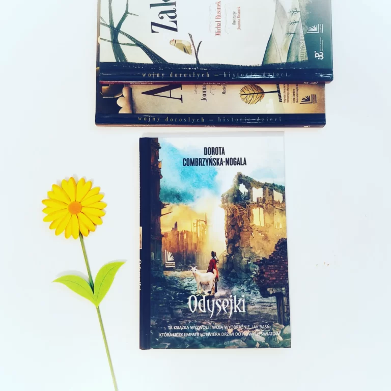 okładka książki Odysejki, wydawnictwo Literatura, obok żółty kwiatek symbolizujący nadzieję